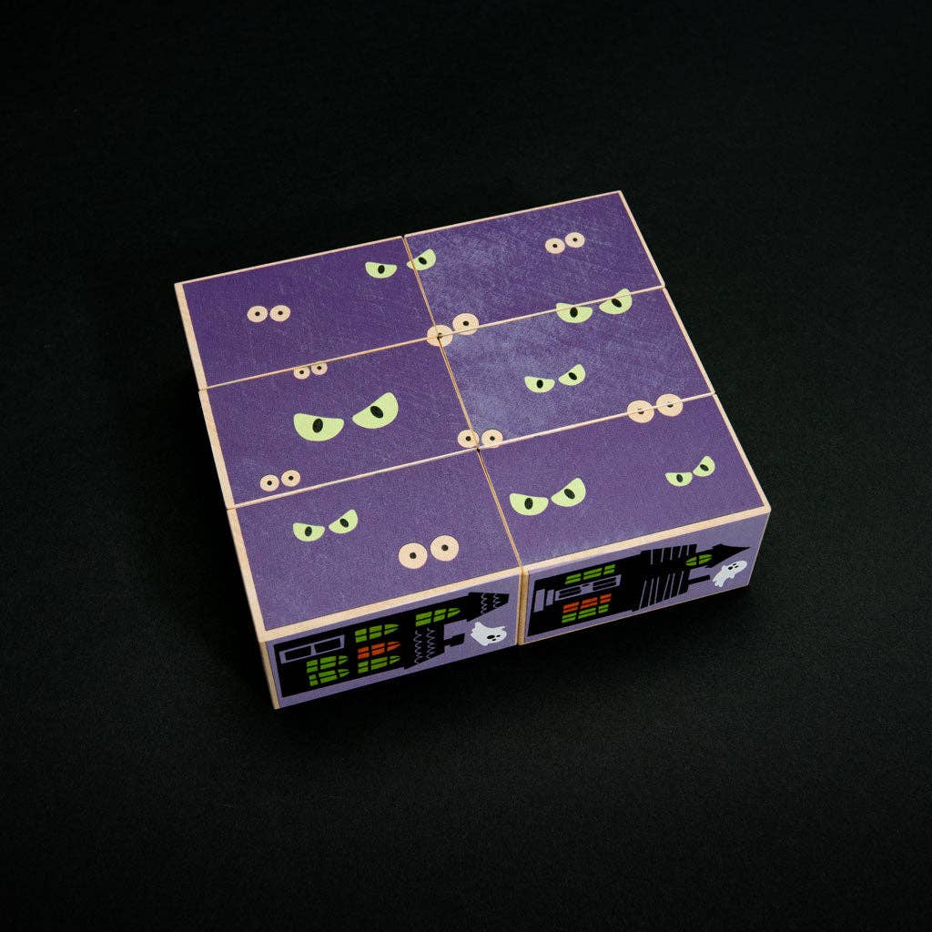 Stack of Halloween-themed wooden alphabet blocks from Uncle Goose