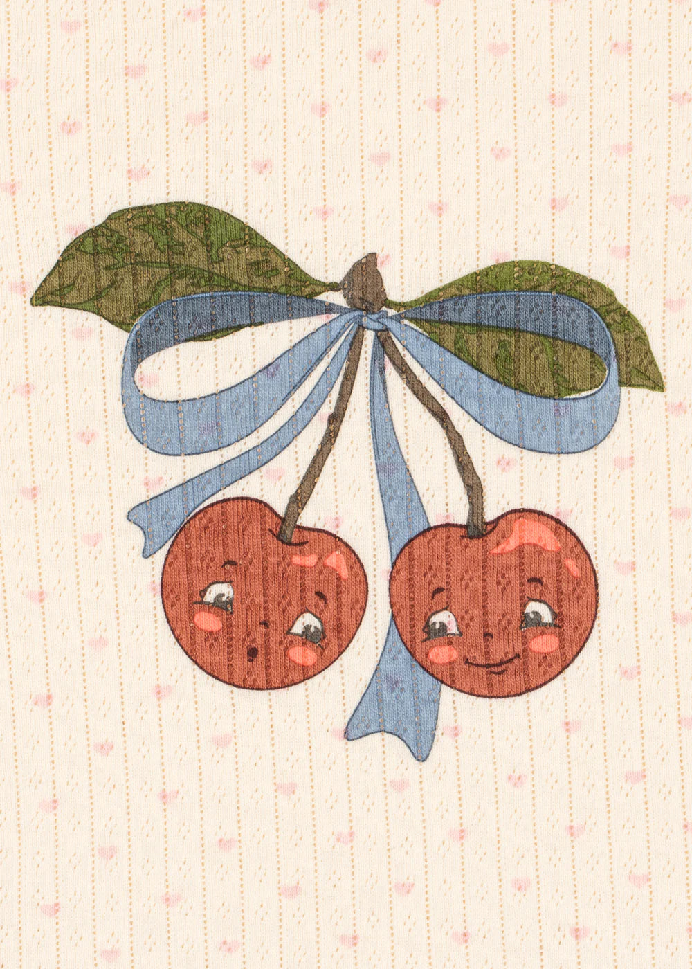 Close-up of cherry motif on Konges Sløjd Minnie blouse, Scandinavian kidswear design