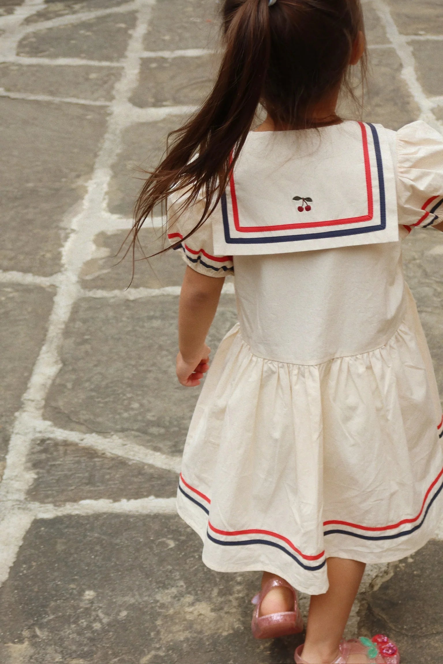 Girl wearing Allie Dress by Konges Sløjd outdoor lifestyle photo