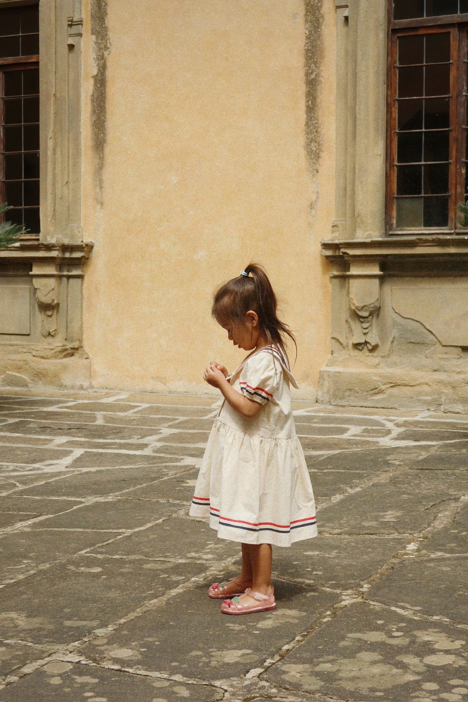 Child in pink Konges Sløjd Lilo sandals, flexible baby and toddler summer shoes