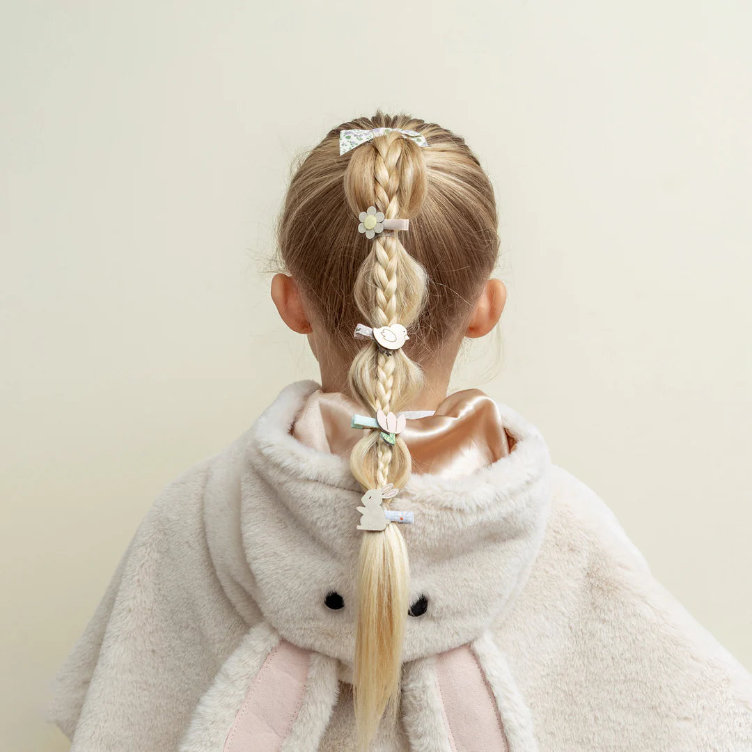 child wearing Mimi and Lula bunny cape costume