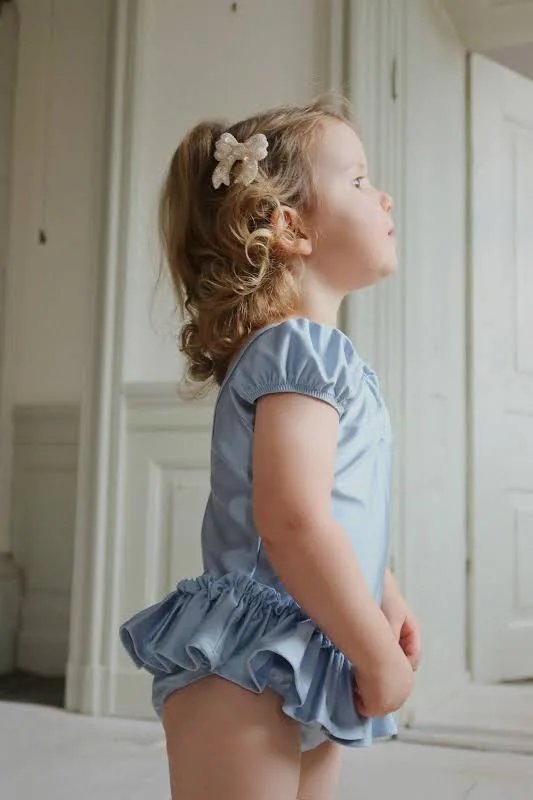 Child styling Konges Sløjd white sequin bow hair clips in hair