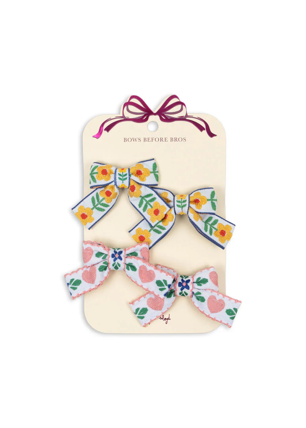 Konges Sløjd 4-pack bow hair clips for kids in white and rose with floral and patterned details