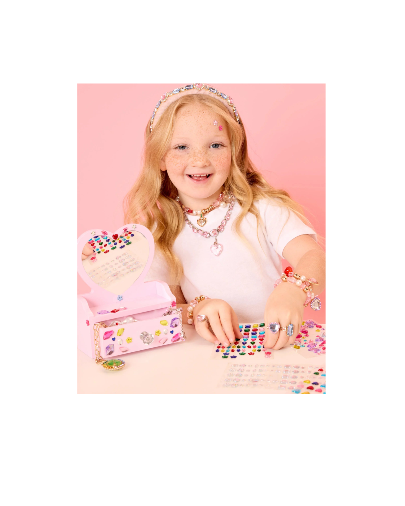 Child using Super Smalls Mini Vanity Gemify Craft Kit