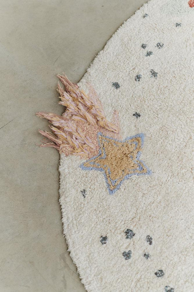 Washable Cotton Rug Interstellar Journey by Lorena Canals shown at scale in a kids' room