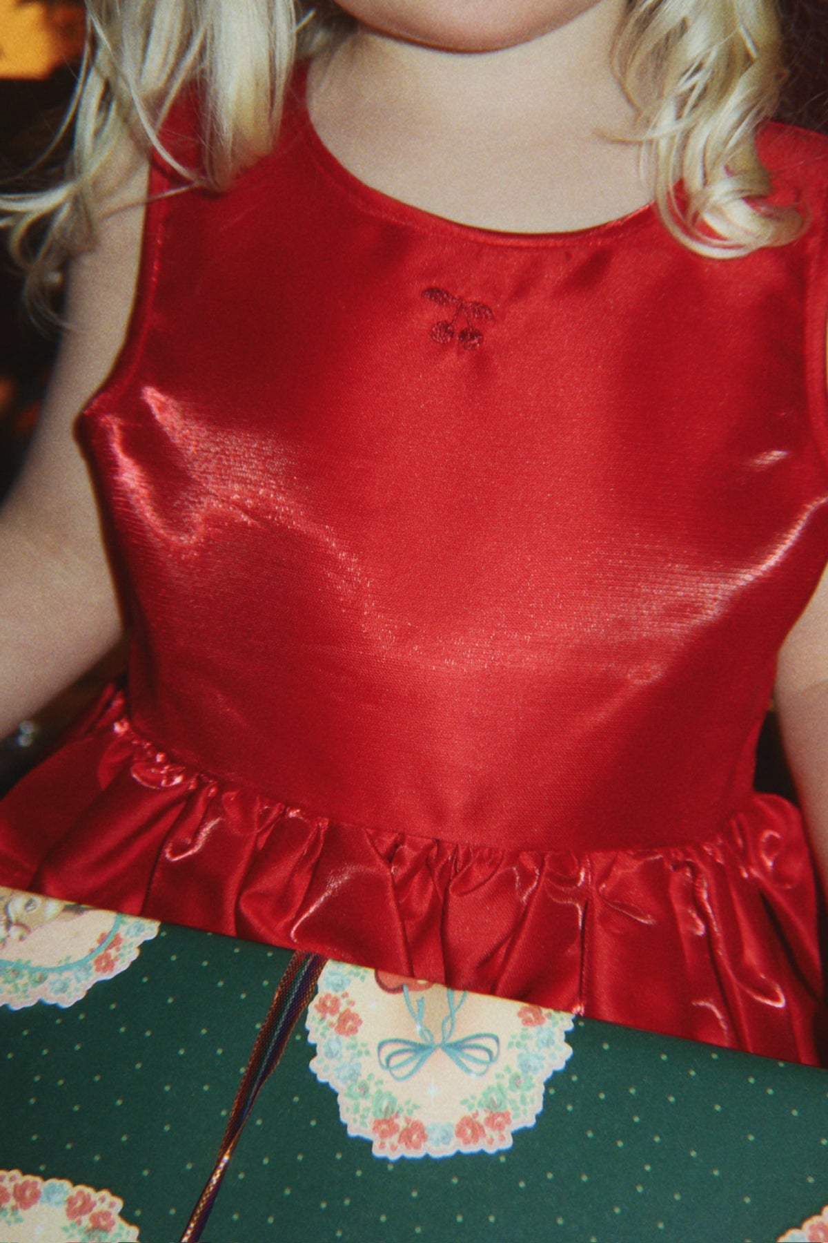 Konges Sløjd Bellis Dress in Barbados Cherry, twirling skirt
