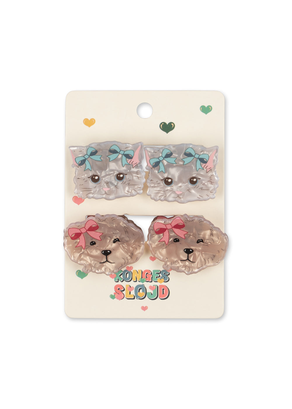 Konges Sløjd 4 Pack Small Hair Claw — set of four kids hair claws in assorted colors on cream background