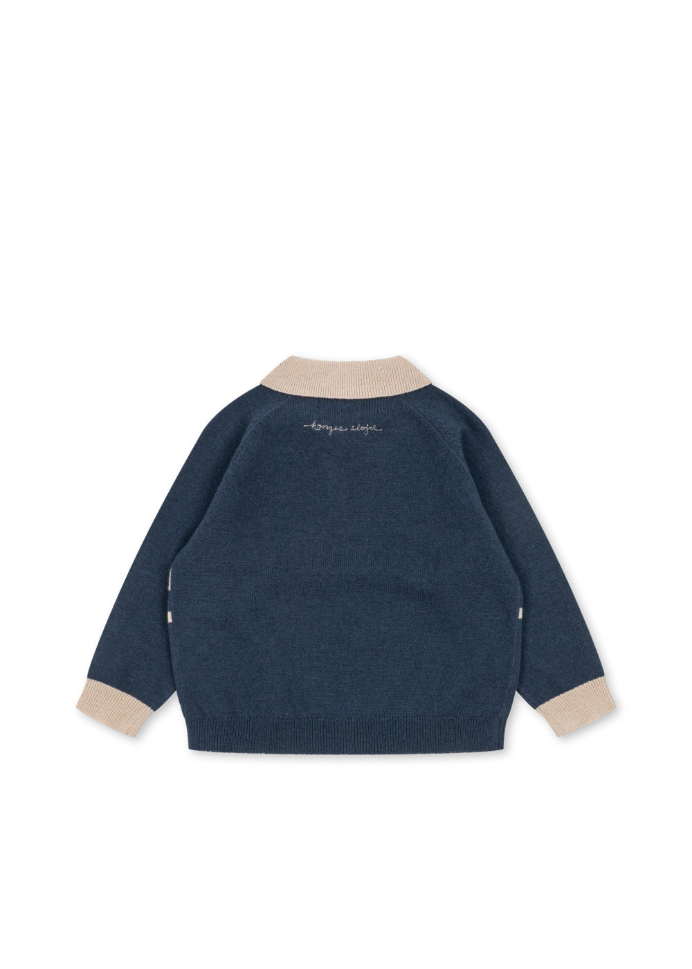 Back view of the navy Basi knit polo with cream collar and cuffs