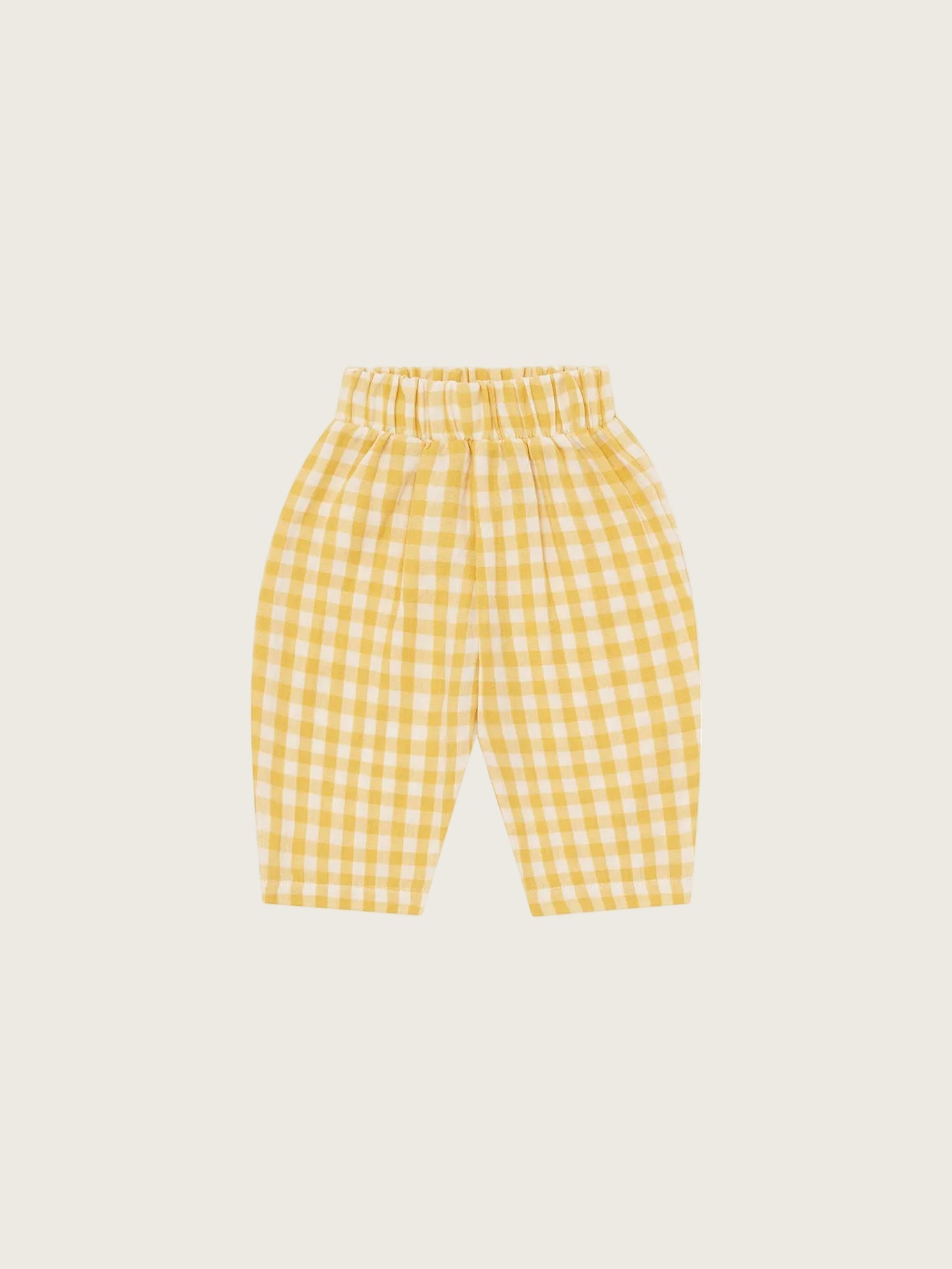 Organic Zoo Honeycomb Gingham Fisherman Pants — relaxed fit organic muslin kids pants with warm honeycomb gingham print, flat lay on cream background