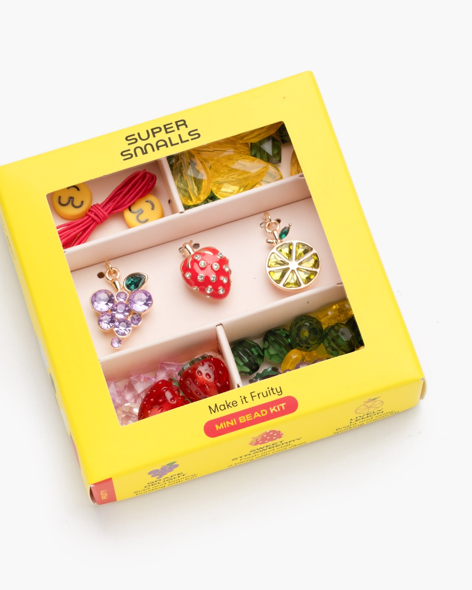 Super Smalls Make It Fruity Mini Bead Kit for kids with colorful fruit-inspired beads in yellow packaging