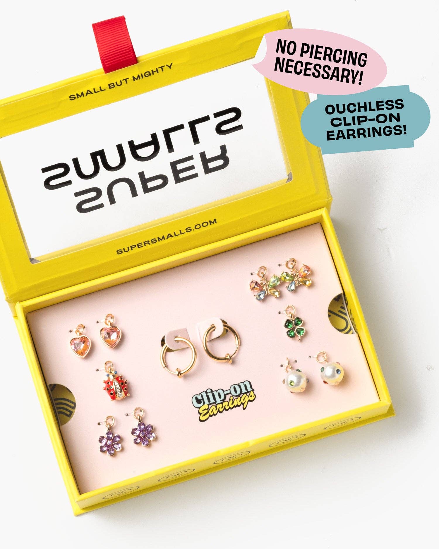 Super Smalls Absolutely Charming Clip-On Earring Set for kids with colorful charm-inspired clip-on earrings in yellow gift box