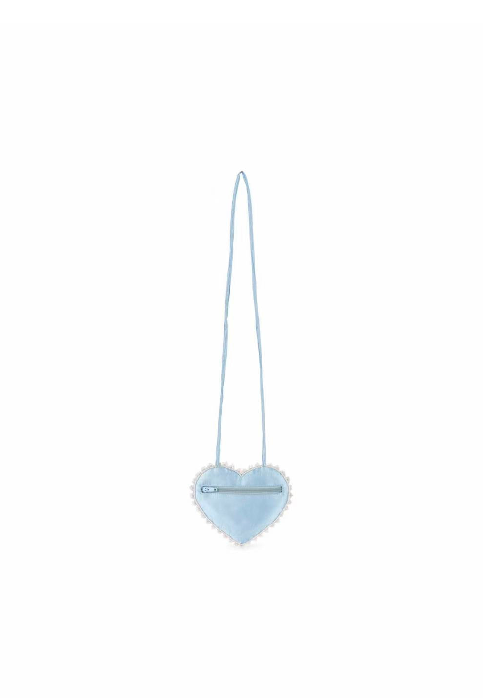 girl wearing beaded heart mini purse crossbody bag