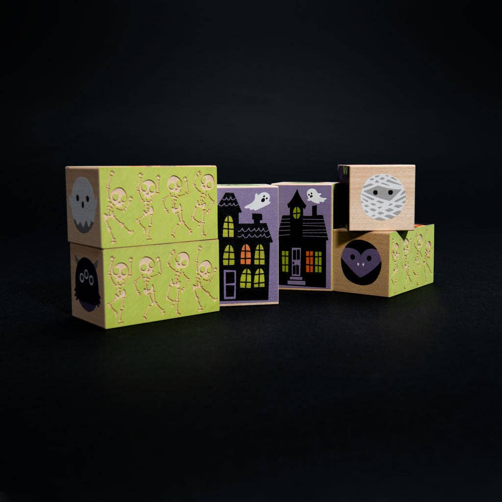 Uncle Goose Halloween blocks with debossed dancing skeleton detail