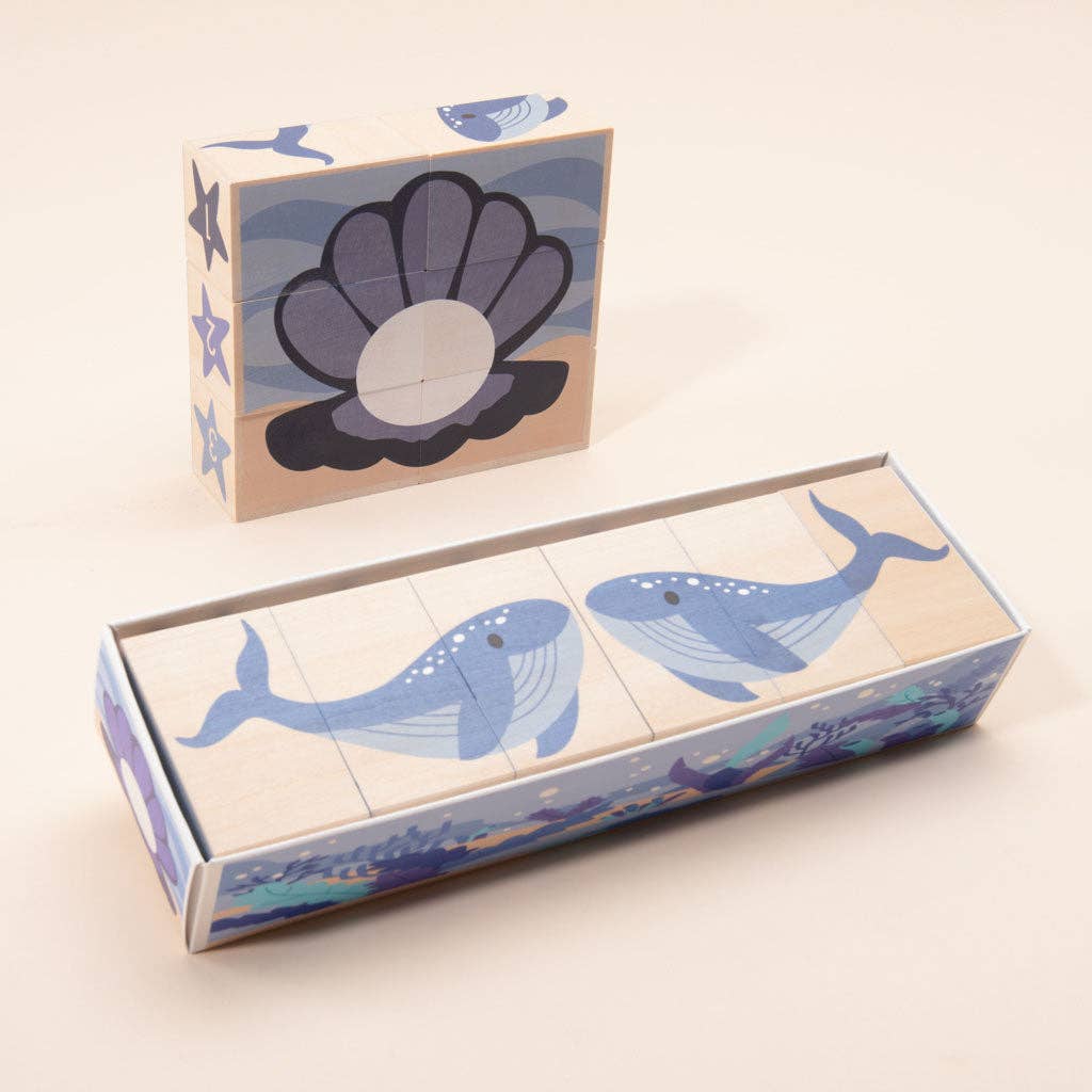 Close-up of ocean-themed wooden blocks showing a coral reef puzzle