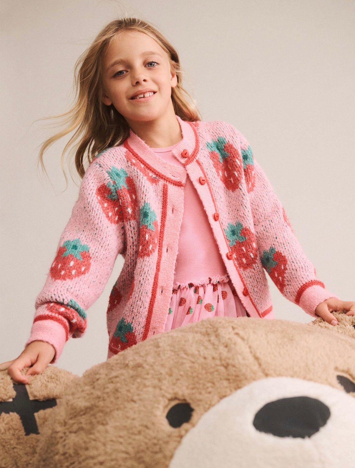 Strawberry Fields Sponge Cardi – Strawberry – Huxbaby (lifestyle view)