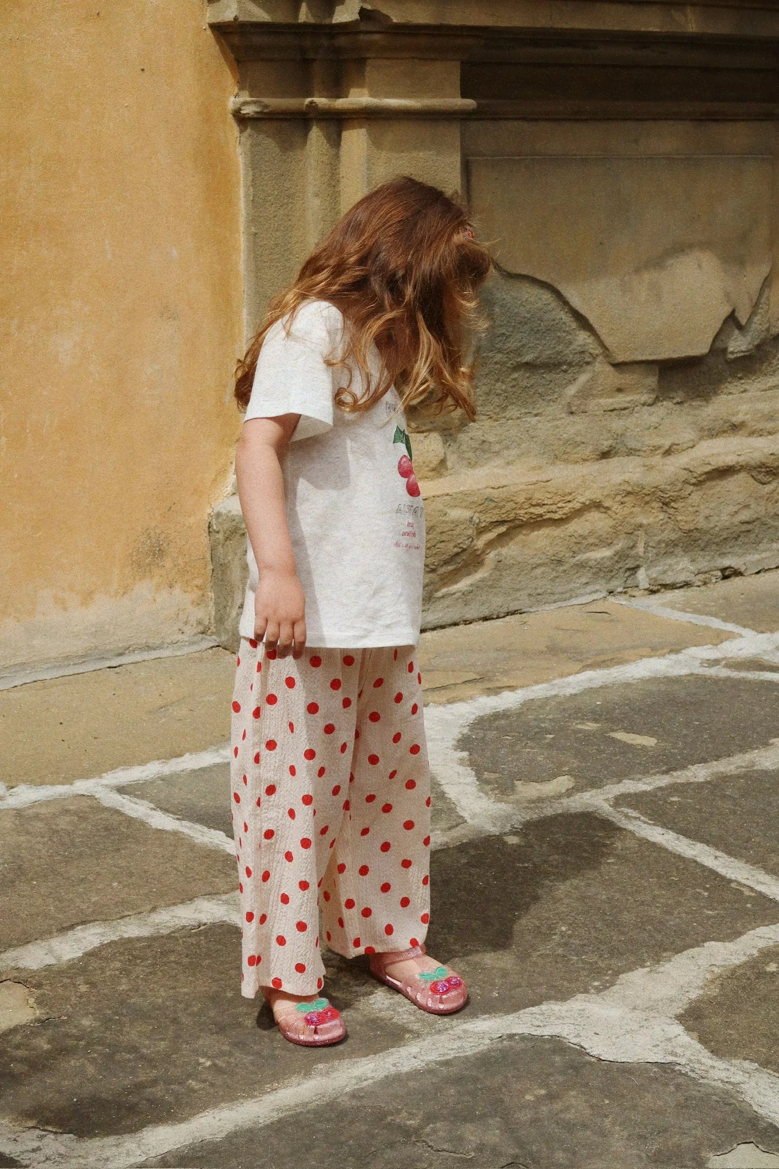 Toddler wearing Vivo Pants by Konges Sløjd, playful baby pants for everyday wear