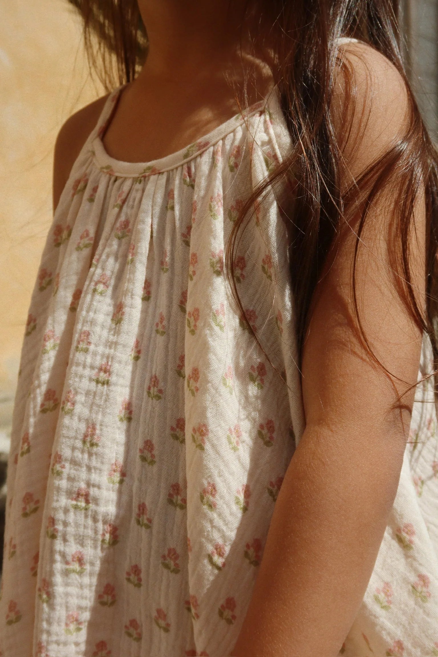 Toddler wearing Coco Strap Dress by Konges Sløjd, comfortable summer baby dress