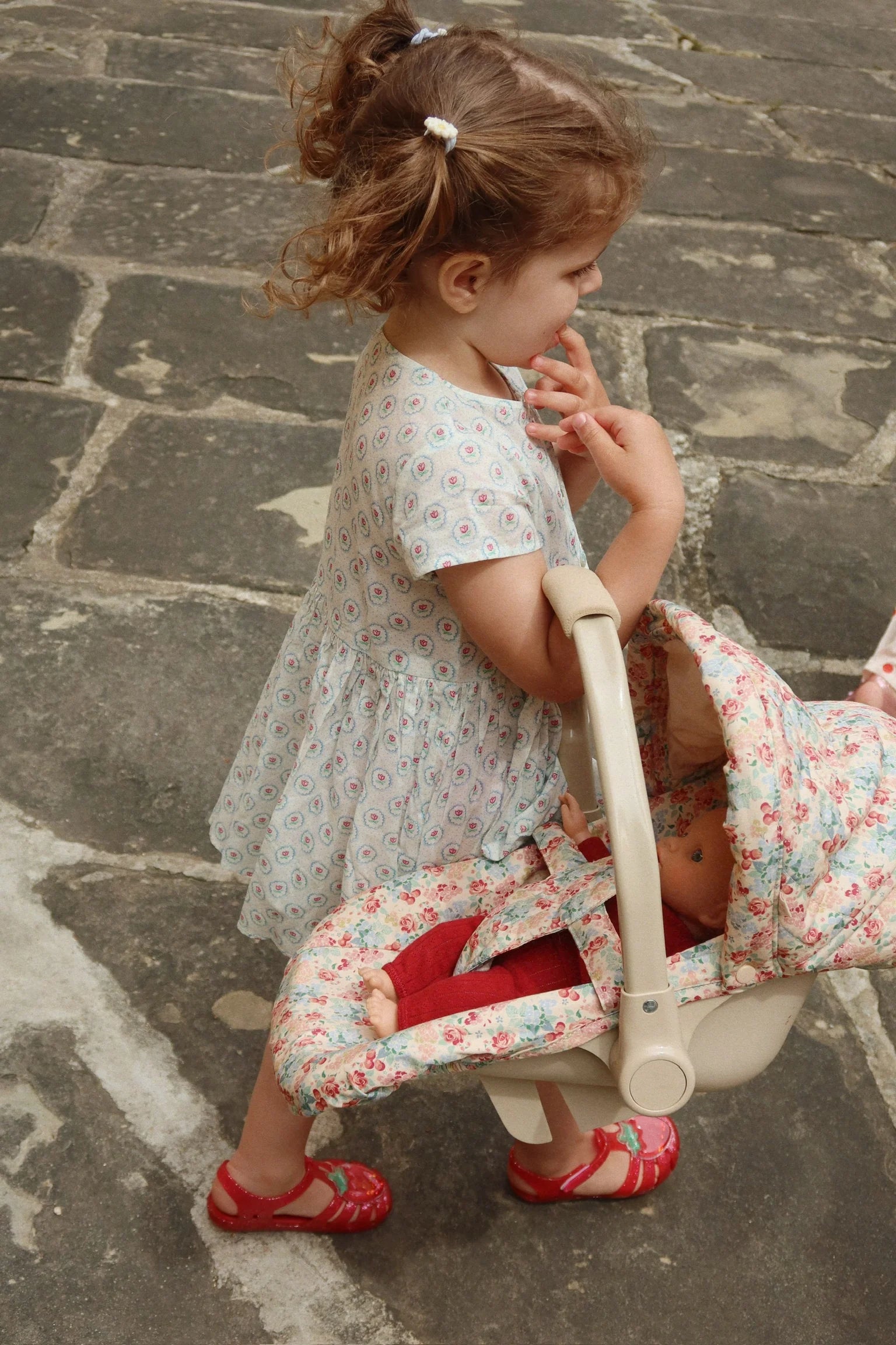 Child wearing Konges Sløjd Lilo sandals outdoors, lightweight baby and toddler summer shoes