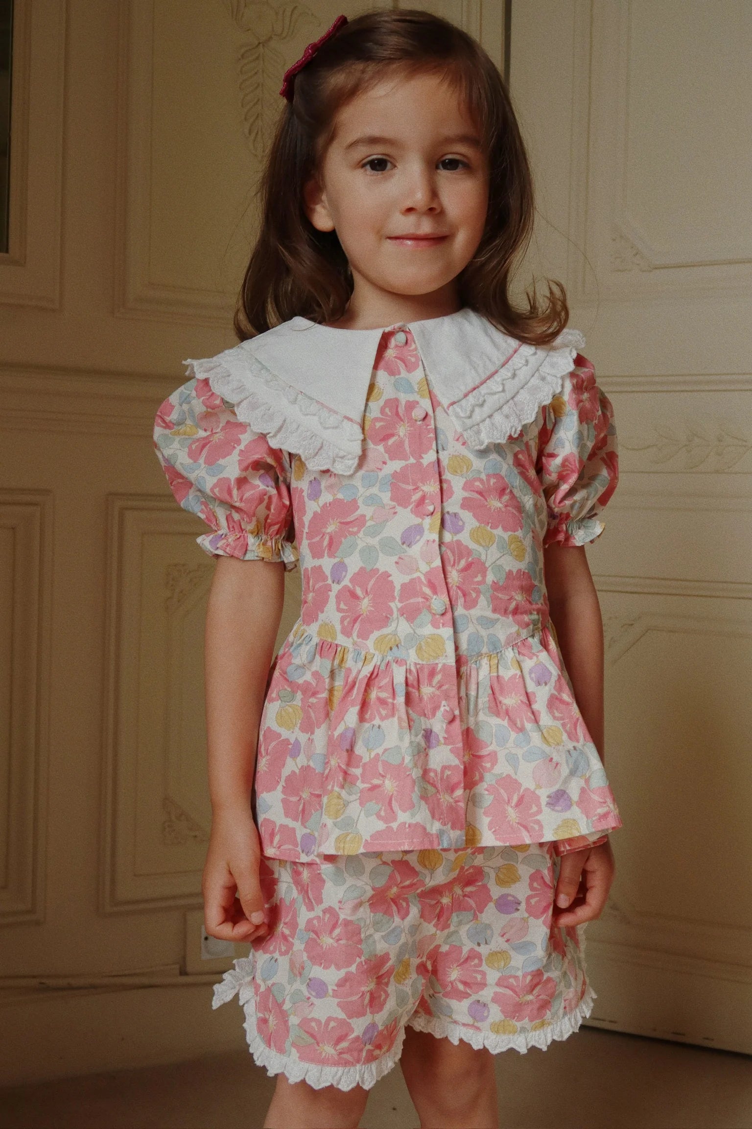 girl wearing Konges Sløjd Coeur collar dress floral design