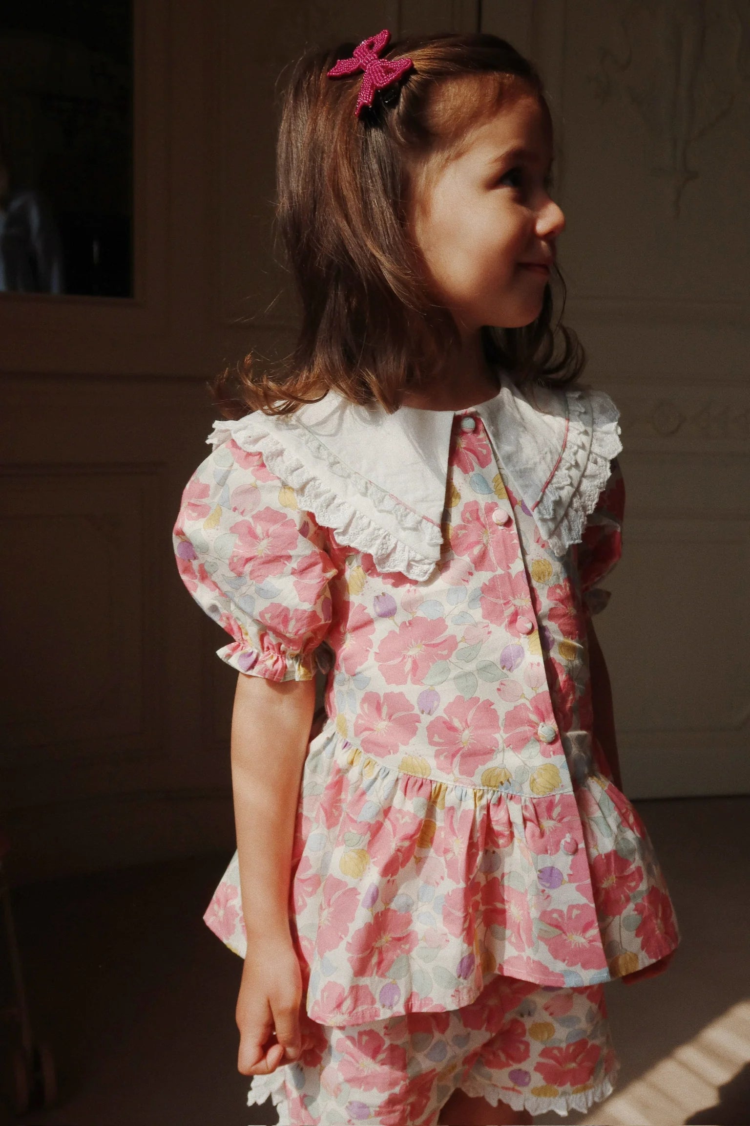 girl wearing Konges Sløjd Coeur collar dress floral design