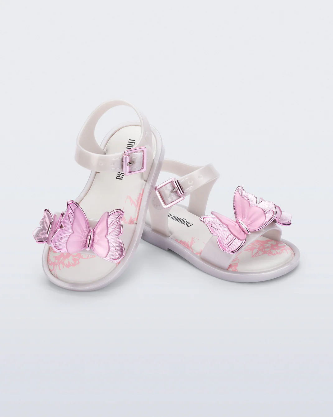 Mini Melissa Butterfly Sandal — pink and lilac kids jelly sandal with 3D butterfly embellishments, pair shown on white background