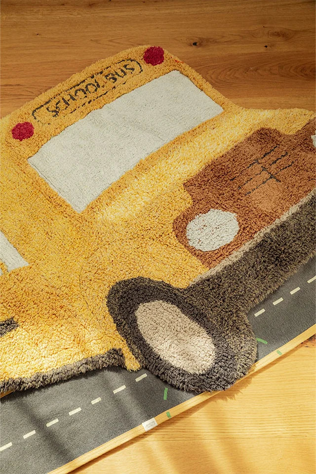 Close-up detail of Washable Rug School Bus' stitching by Lorena Canals