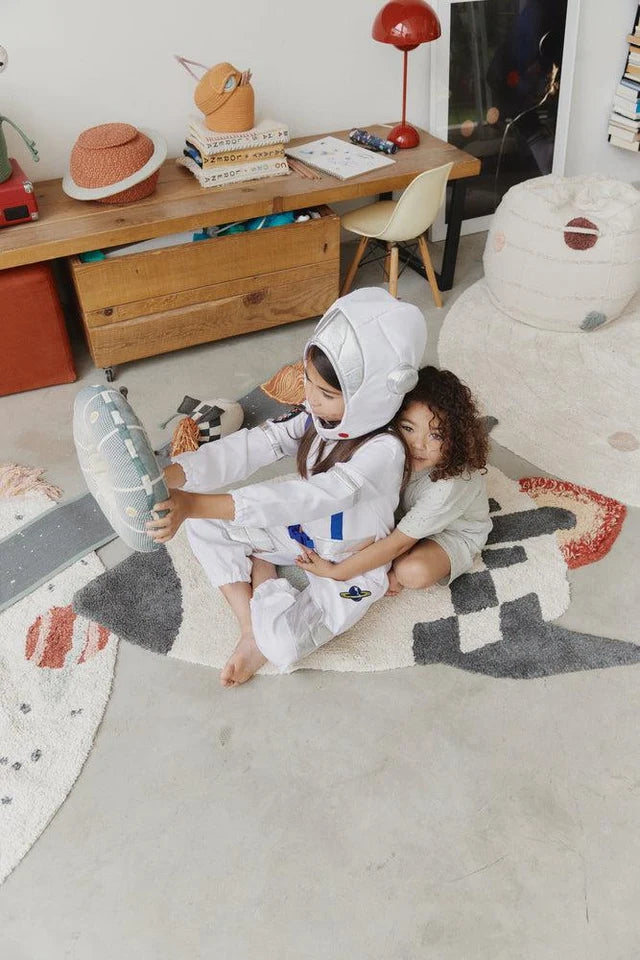 Washable Cotton Rug Rocket by Lorena Canals shown at scale in a nursery