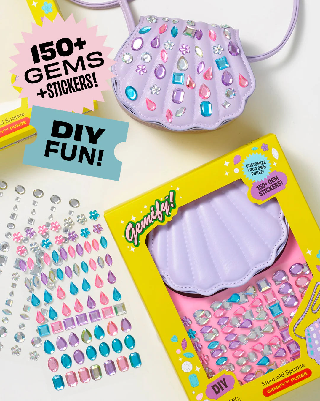 Supersmalls Mermaid Sparkle Gemify Purse — kids DIY shell-shaped crossbody purse kit with 150+ gem stickers in mermaid theme, shown in yellow gift box