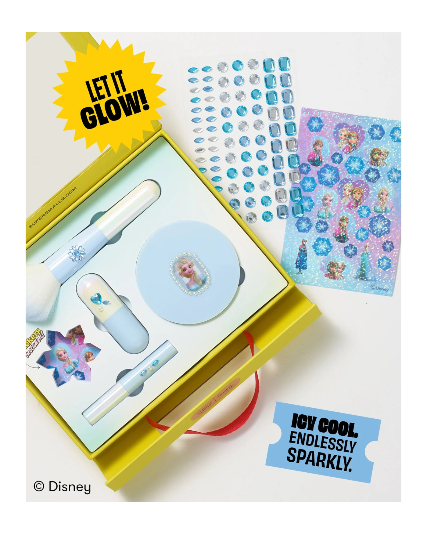 Supersmalls Disney Frozen Elsa Makeup Kit — officially licensed kids makeup set with gem stickers and glitter in icy blue tones, shown in yellow gift box
