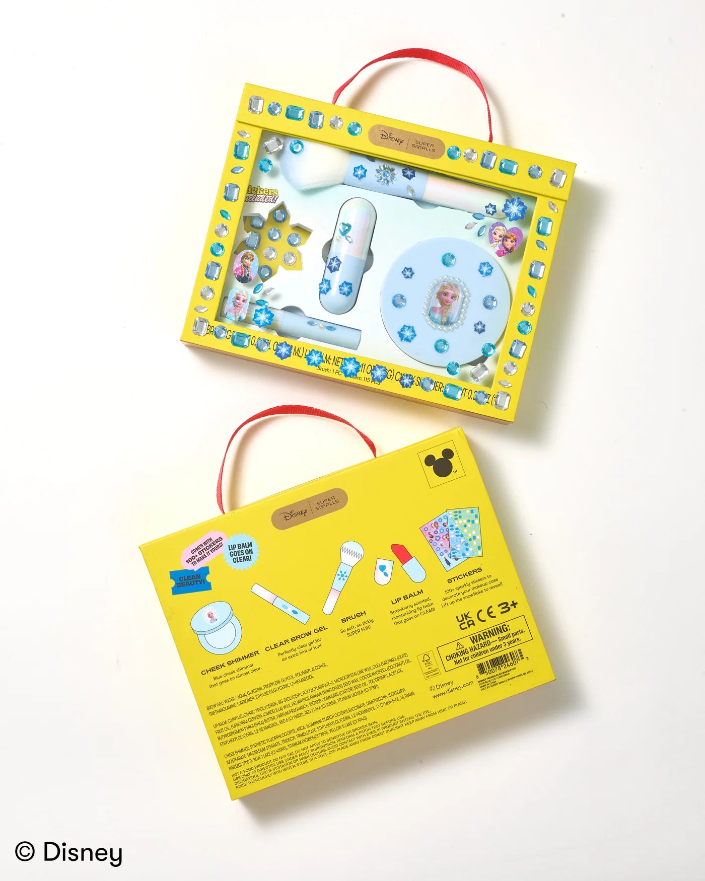 Supersmalls Disney Frozen Elsa Makeup Kit — officially licensed kids makeup set with gem stickers and glitter in icy blue tones, shown in yellow gift box
