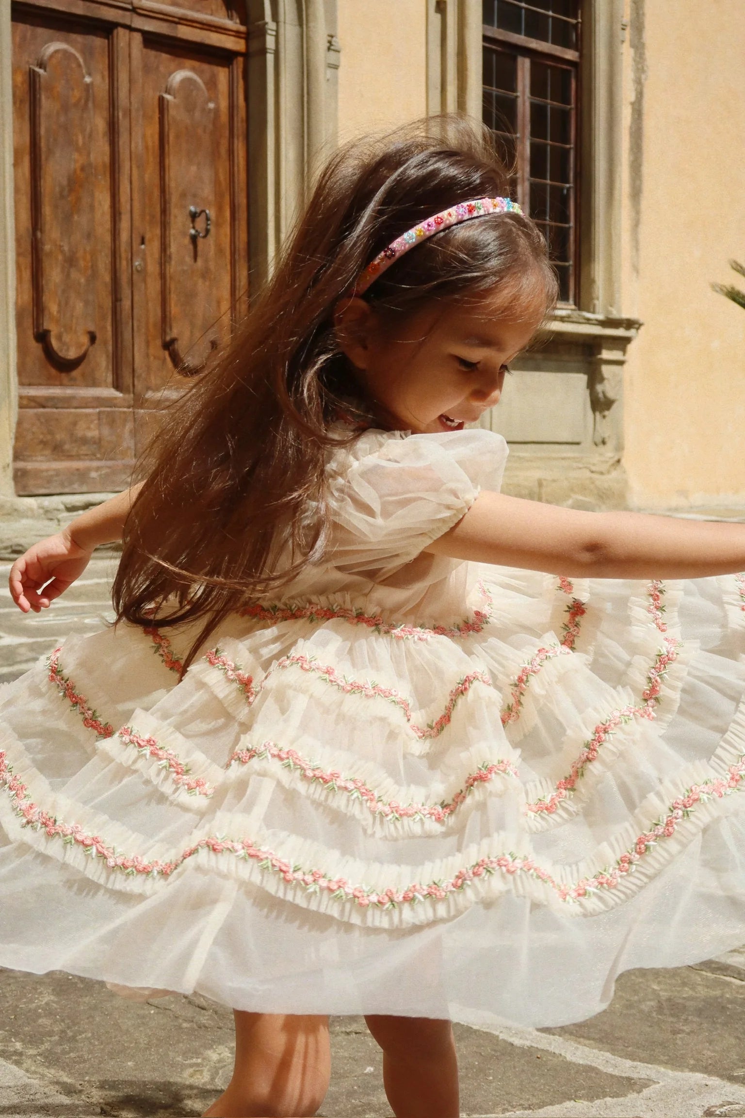 Child wearing Konges Sløjd Flower Field hairbrace Scandinavian kids accessory
