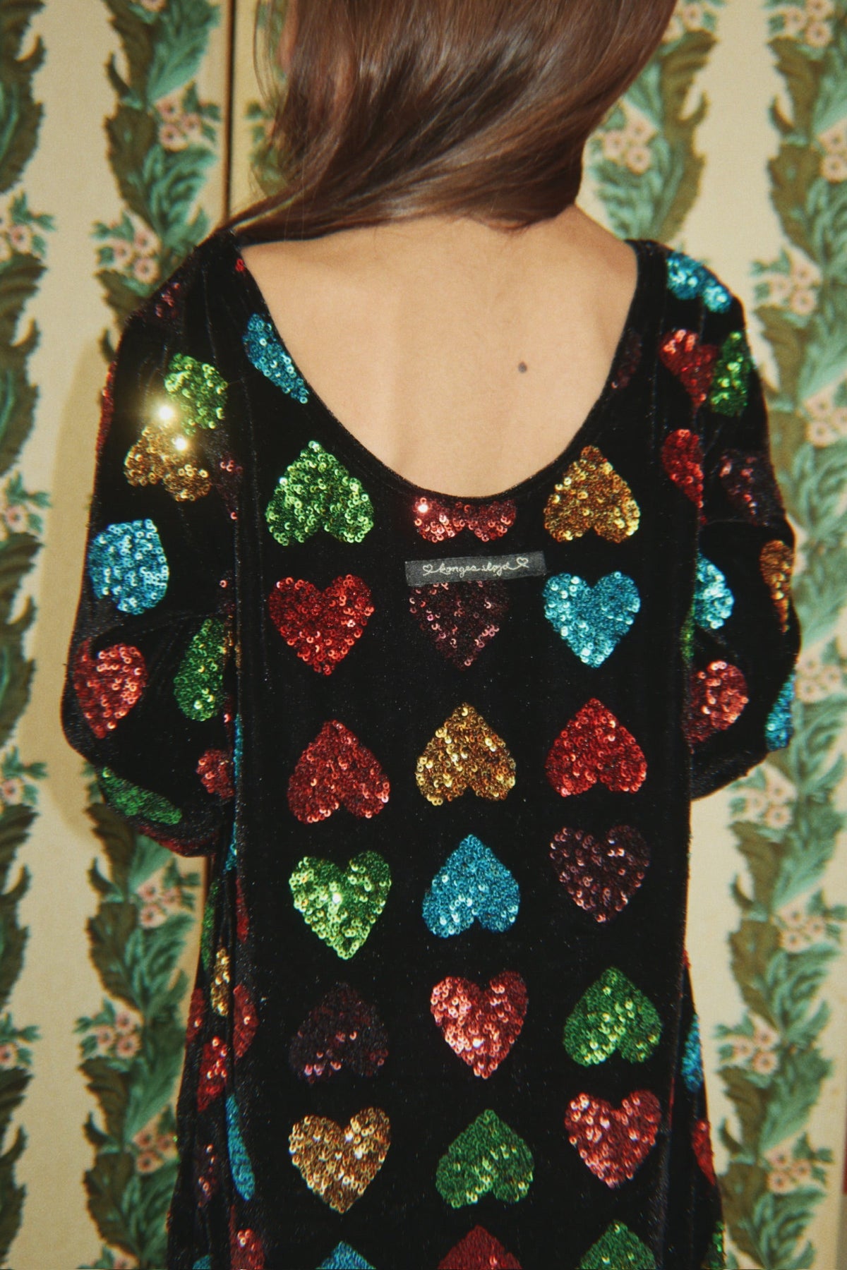 Girl wearing Konges Sløjd Cuore Dress in Amour Sequin