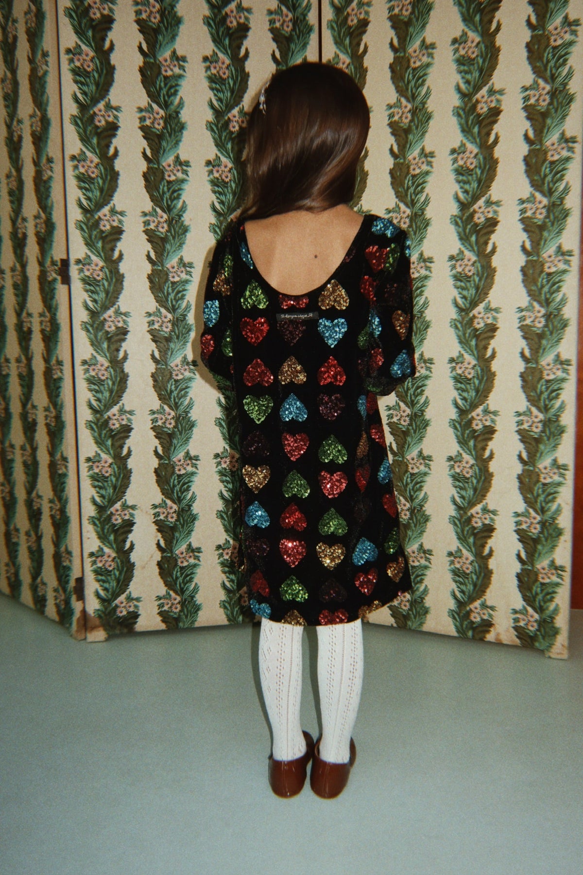 Konges Sløjd Cuore Dress in Amour Sequin, worn with tights
