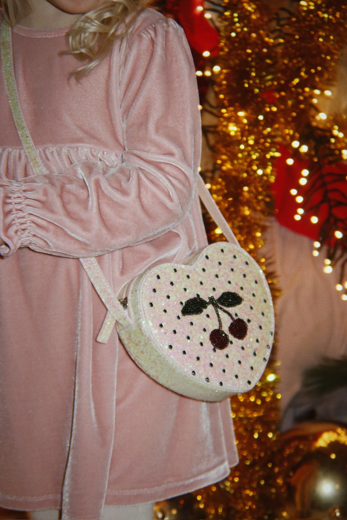 Konges Sløjd Gia Bow Dress in Mellow Rose, styled with bag