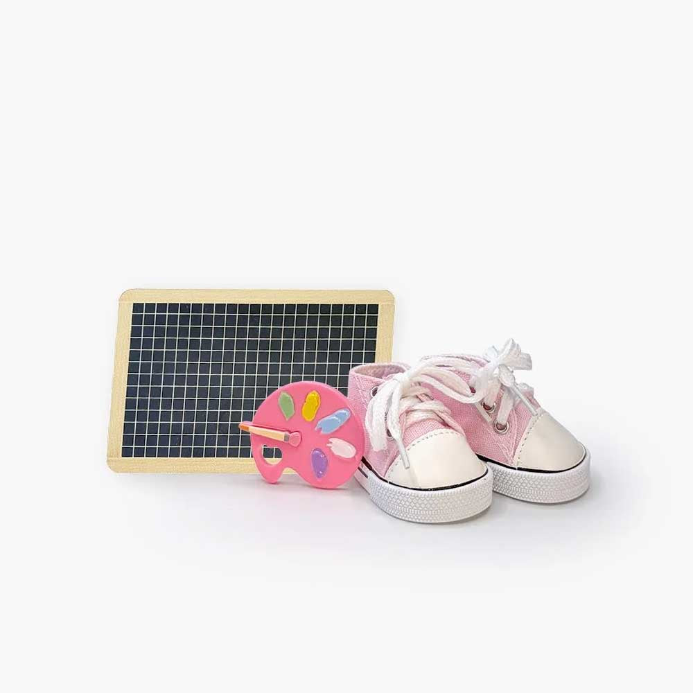 Minikane Mini Panchas painting accessory set with marshmallow pink Komvers sneakers, paint palette and mini chalkboard