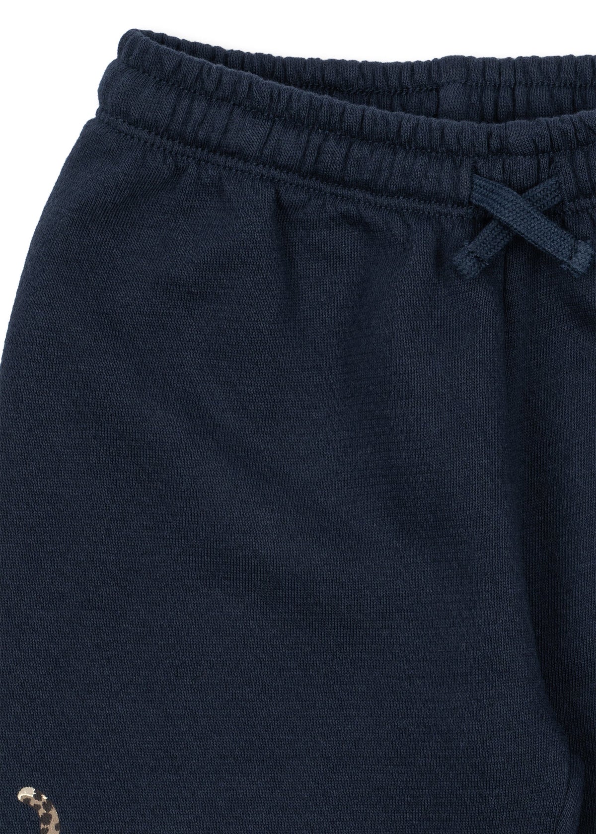 Close-up of the drawstring elastic waistband on the navy sweatpants