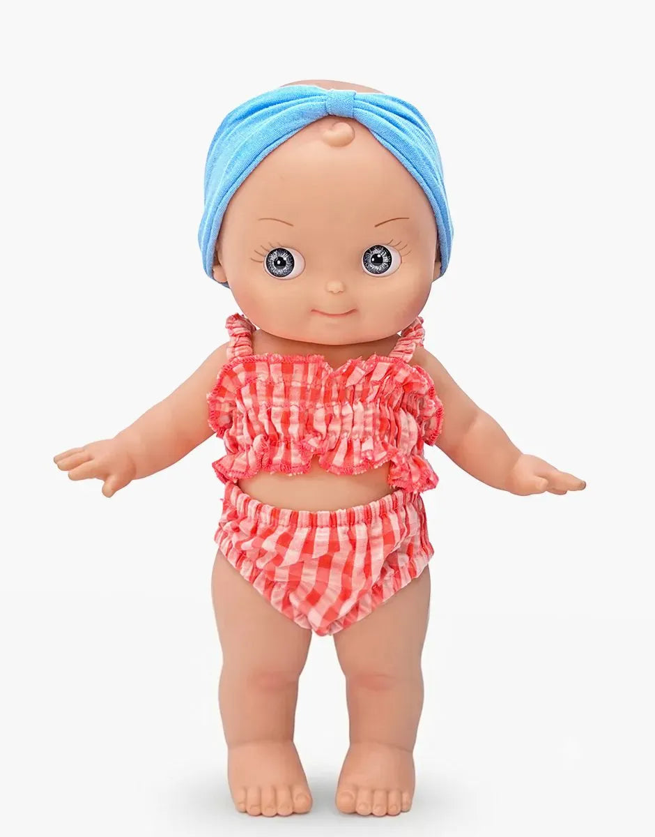 Alice Mini Pancha doll in Riviera blue and red gingham beach set by Minikane