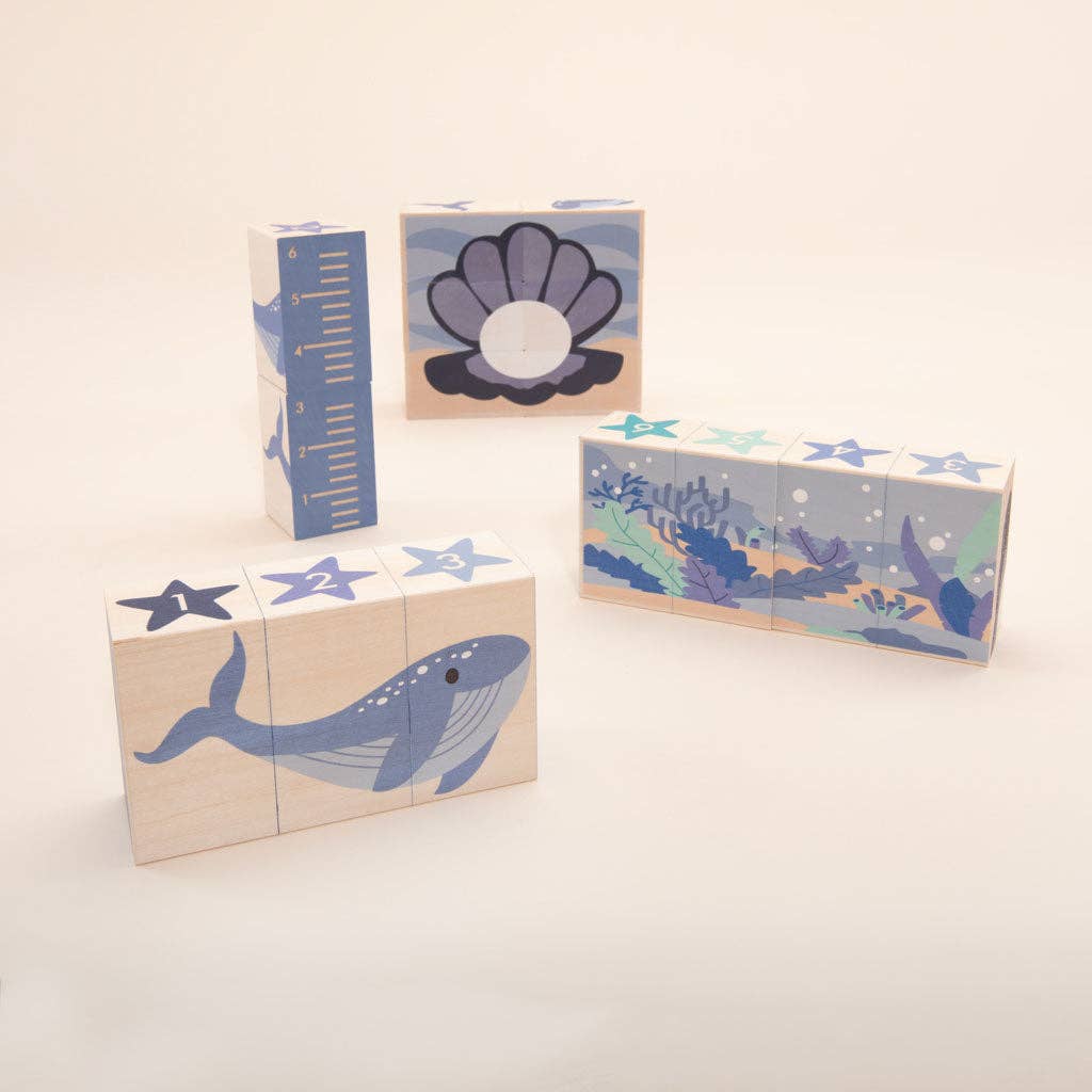 Six wooden Ocean blocks from Uncle Goose displayed together