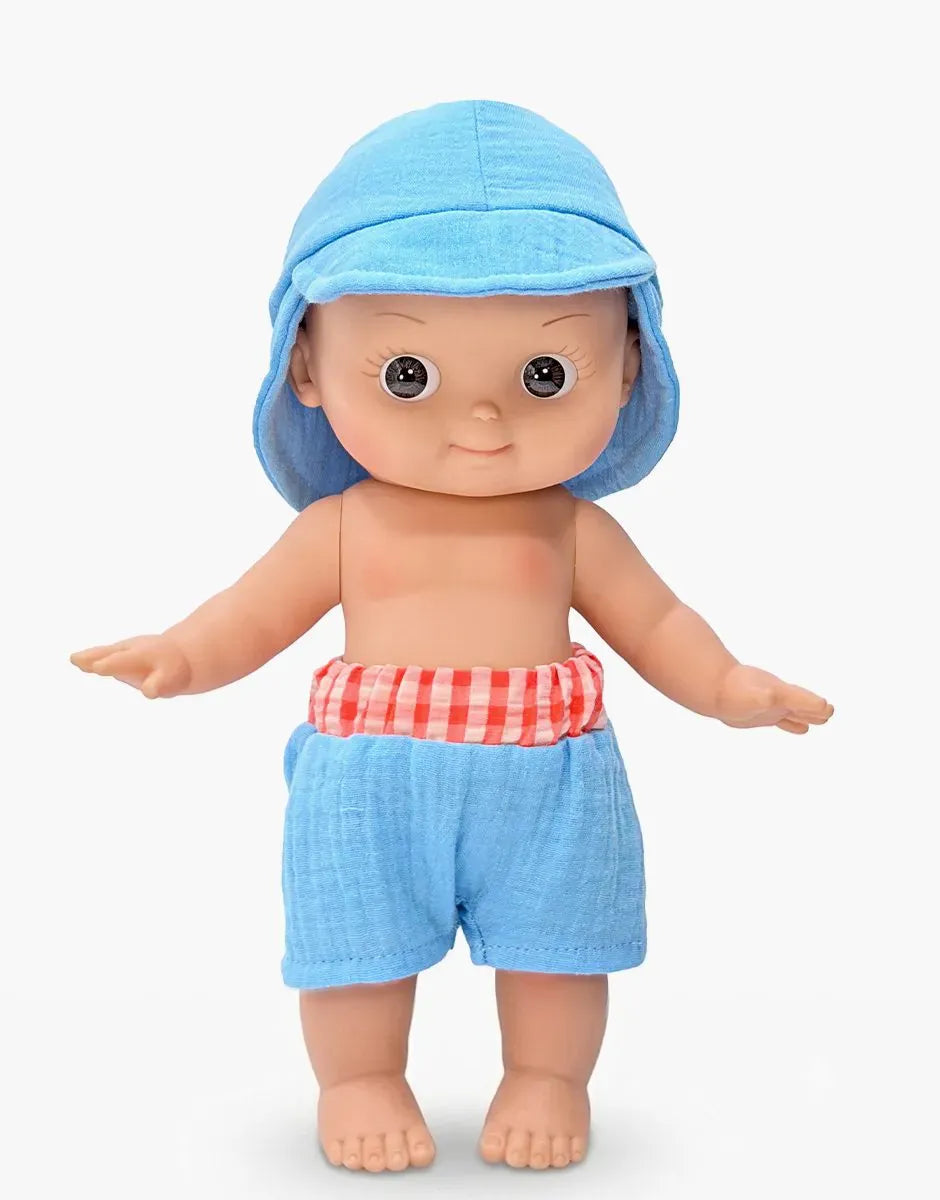 Basile Mini Pancha doll in Riviera blue and red gingham beach set by Minikane