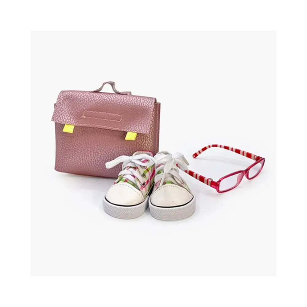 Mini Panchas school accessory set with pink faux leather schoolbag by Minikane
