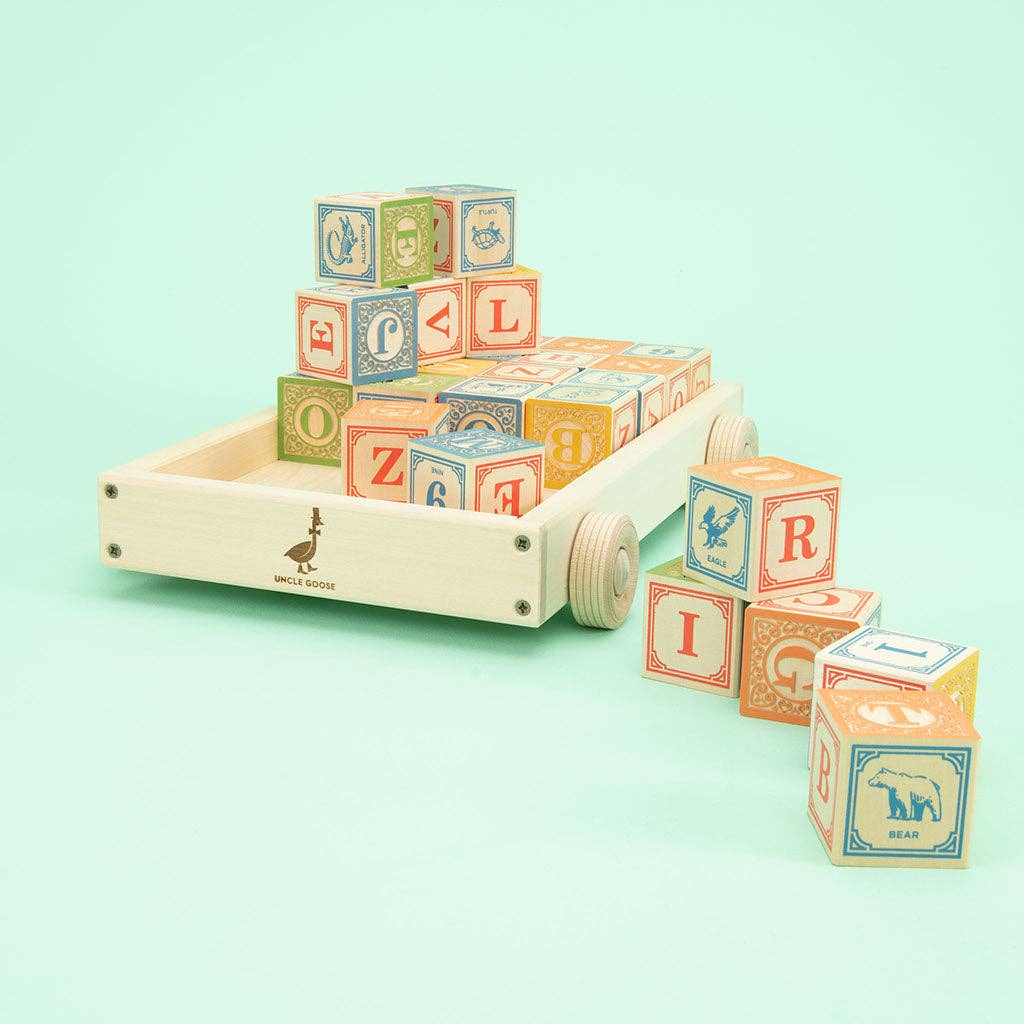 Classic ABC blocks with colorful numbers and math symbols in the Uncle Goose wagon