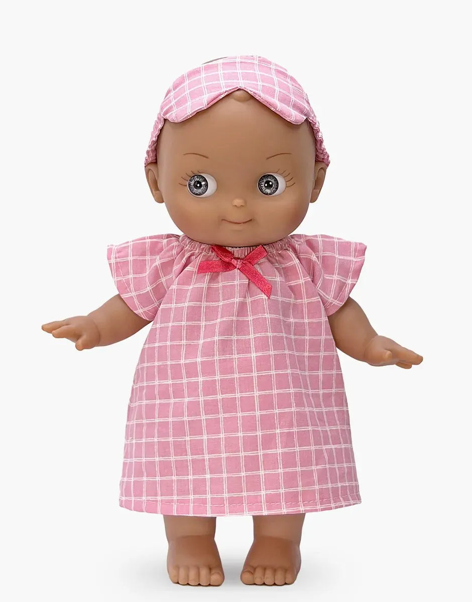 Maïa Mini Pancha doll in pink and white check nightgown set by Minikane