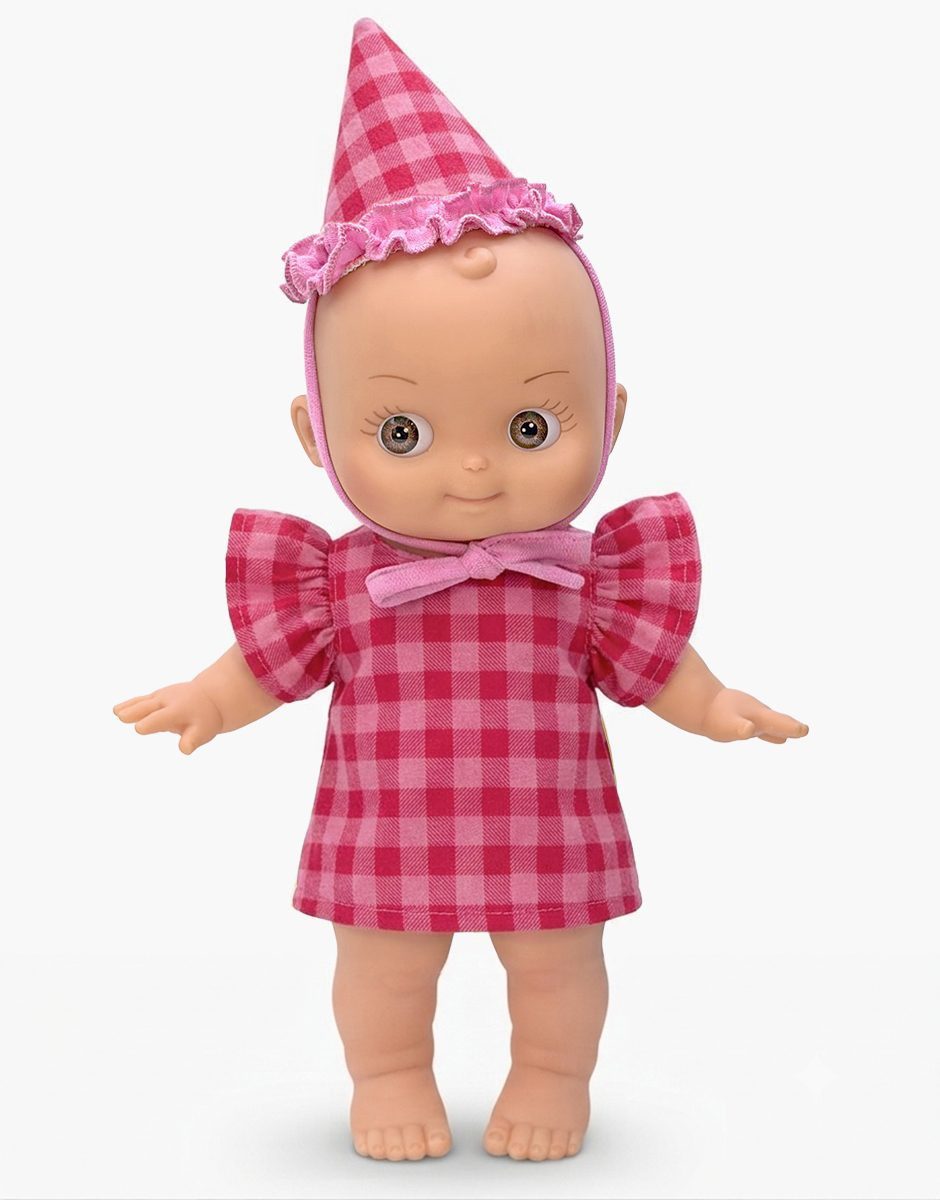 Ninon Mini Pancha doll in cherry gingham party dress and pointed hat by Minikane