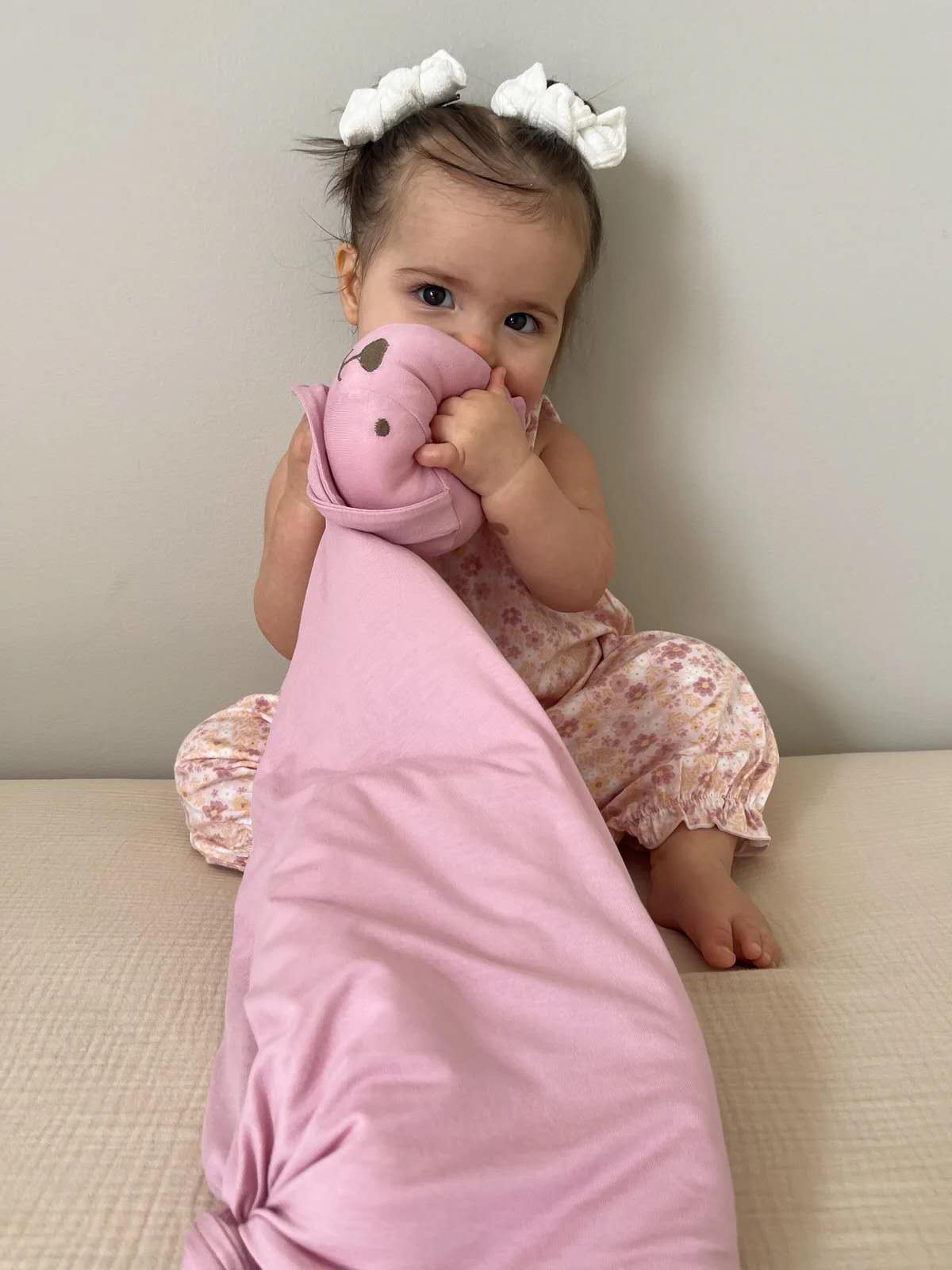 gūnamūna Bunny Lovey Rosie — rosy pink plush bunny lovey shown with baby, soft and comforting